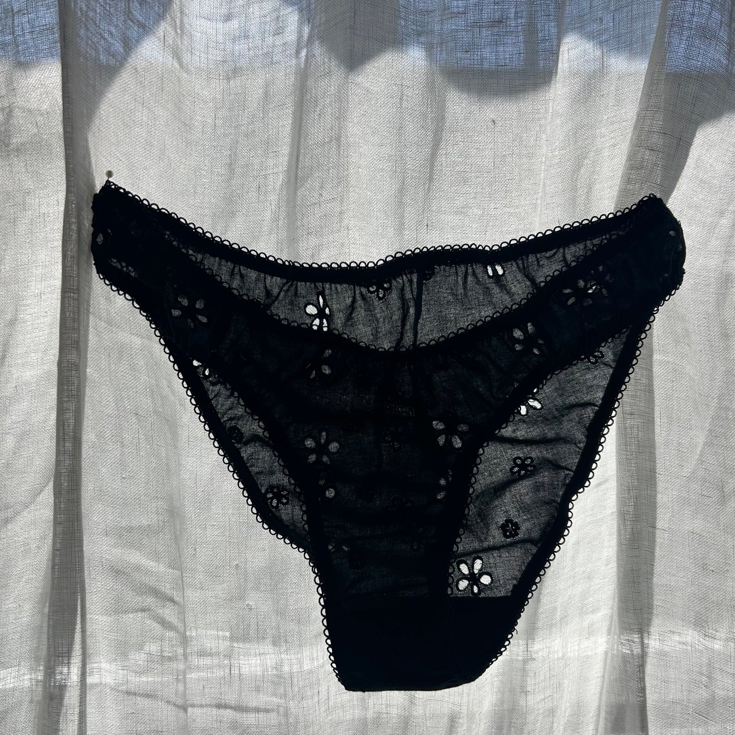 brief in black eyelet