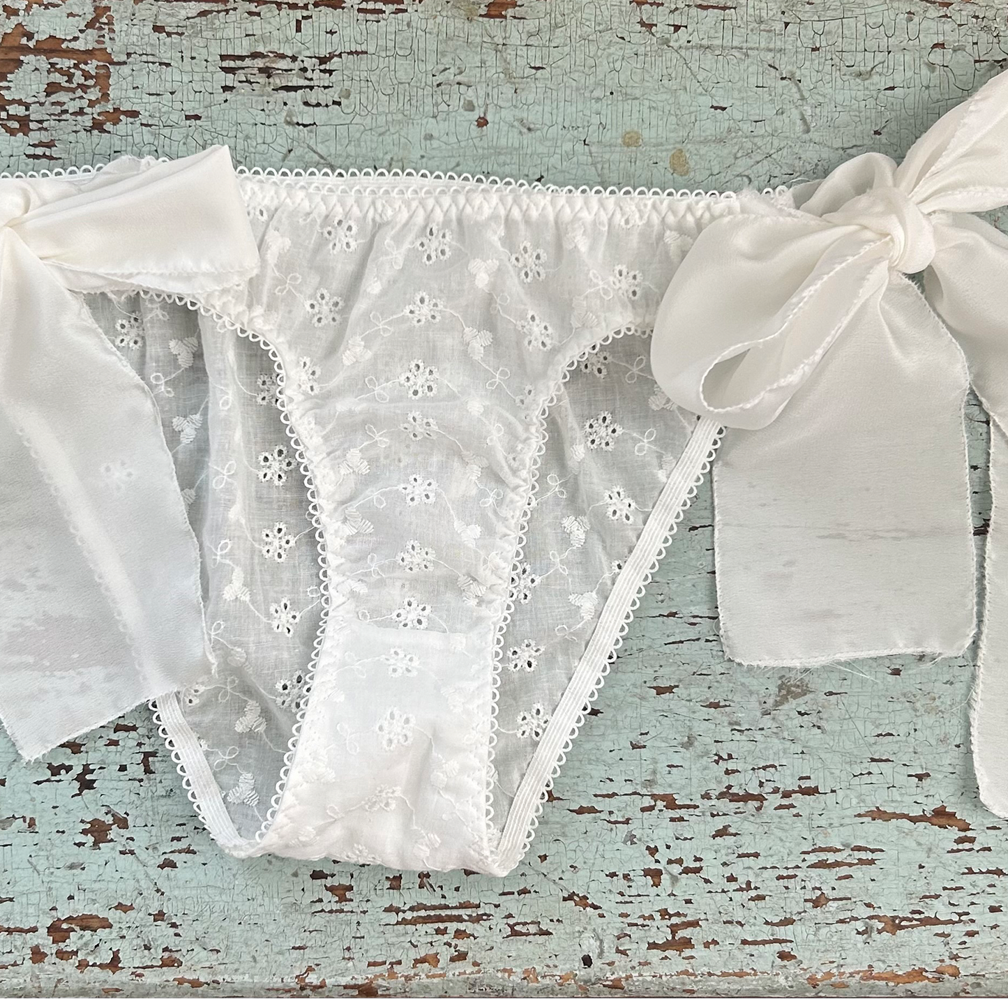 silk tie-side brief in white eyelet